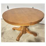 Oak pedestal dining table
