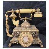Ornate Rotary Phone backed by Onyx Telephone Cente