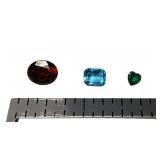 Loose gemstones - garnet, aquamarine, emerald