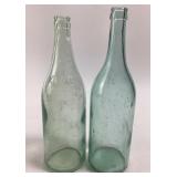 2 large vintage bottles