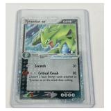 Pokï¿½mon vintage holographic Tyranitar ex card