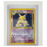Pokï¿½mon vintage holographic Alakazam card