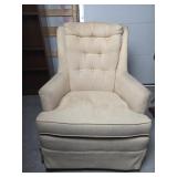 Beige Upholstered Armchair With Tufted Back