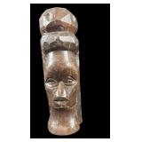 Hand-Carved Wooden Figurine With Geometric Feature