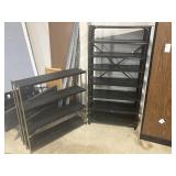 2 black metal shelves