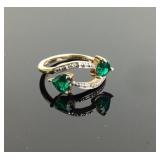 10k SR stamped ring with green heart emerald like