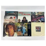 10 vinyl records: ABBA, Paul Simon, Barry Manilow