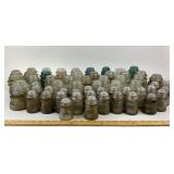 Glass Insulators in Clear, Aqua, Amber Colors