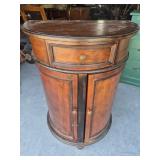 Wood Storage Cabinet With A Half-Moon Tabletop, A
