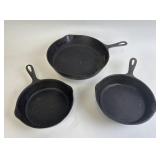 3 cast iron pans: 8 inch, two 5 inch