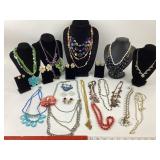 Costume Jewelry: Silver tone ribbon pendant
