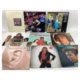 10 vinyl records: ABBA, Paul Simon, Barry Manilow