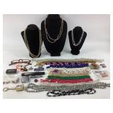 Costume Jewelry: beaded necklaces, beaded glasses