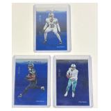3 numbered football cards