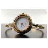 Gucci Gold tone 1100-L gold tone changable bezel