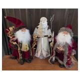 Holiday Santa Figurines in Red, White Robes