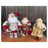 Santa Claus Figurines in Festive Attire