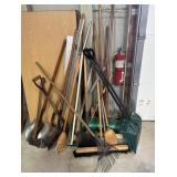 Yard tools: shovels, rakes, brooms, ax