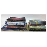 Books by John Grisham, Leila Meacham, Robb