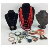 Costume Jewelry: 1928 green necklace, owl bracelet