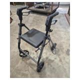 Four-Wheeled Rollator Walker Featuring A Padded