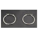 10k Stamped White Gold hoop earrings, .64g TW