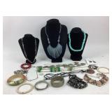 Costume Jewelry: Silver tone carved bird necklace,