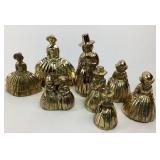 Brass Bells Shaped As Figures In Period Dress
