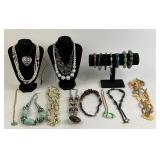 Costume Jewelry: Pearl like and black chain, chip
