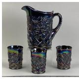 Purple Carnival glass Water pitcher and 3