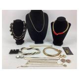 Costume Jewelry: Micheal Kors gold tone necklace,