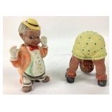 Porcelain Figurines Depicting Two Children