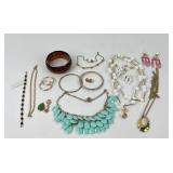 Costume Jewelry: Michael Kors pierced earrings,