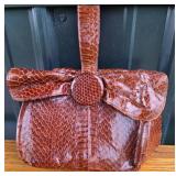 Brown Snakeskin Handbag With Bow Closure