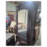 Dark-Stained Wooden Hall Tree On Wheels With A