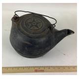 Cast Iron Teapot with Star Motif and Wire Handle