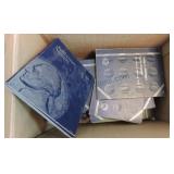 Box of coin albums and supplies