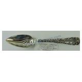 Wallace sterling silver fruit spoon with swirled