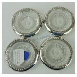 Set of 4 glass coasters with sterling silver rims