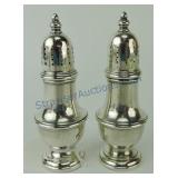 Sterling silver pair of salt & pepper shakers,