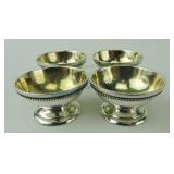 Set of 4 silver plate salts, gold wash bowls