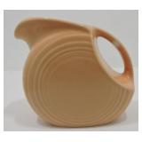 Fiesta Post 86 disc juice pitcher, apricot