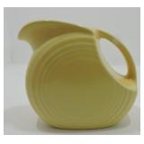 Fiesta Post 86 disc juice pitcher, yellow