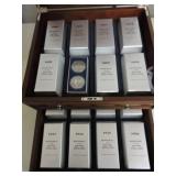 Lot of 22 Morgan and 10 Peace dollars in