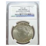 1928 Peace dollar NGC unc details, cleaned