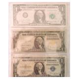 US currency lot: 1935 $1 gold seal silver