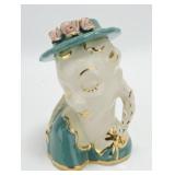 Lady head vase 6 1/2", some flower loss