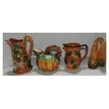 Majolica style lot of 4 pitchers Majolica style lot of 4 pitchers