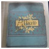 Scrapbook with trade cards and cut outs