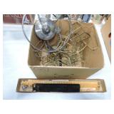 Lot of wire plate/bowl holders and measures